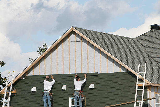 Professional Storm Damage Siding Repair technician working in Cranberry Township, PA